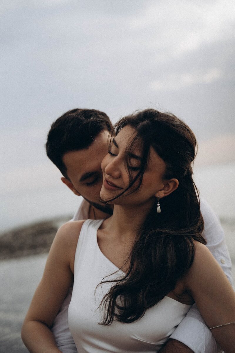 A man and a woman standing next to each other